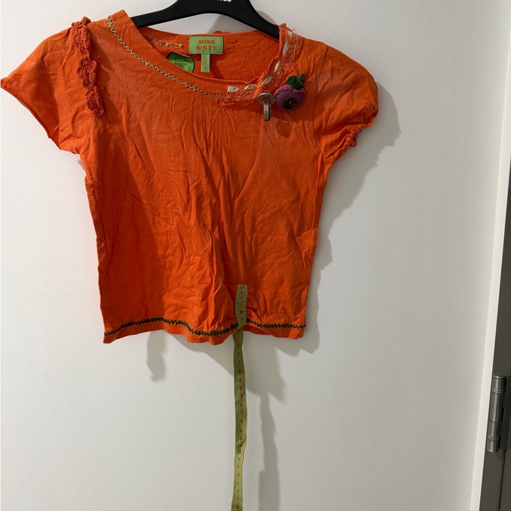 Miss Sixty Bright Orange Short Sleeve Top with Floral Brooch